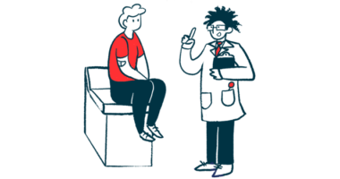 A doctor gestures with one hand while speaking with a patient who's sitting on an examining table.