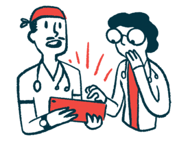 Two doctors show surprise while looking at a table screen.