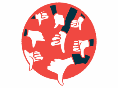 A bit more than a half-dozen hands are shown in a circle, all giving the thumb's down sign.
