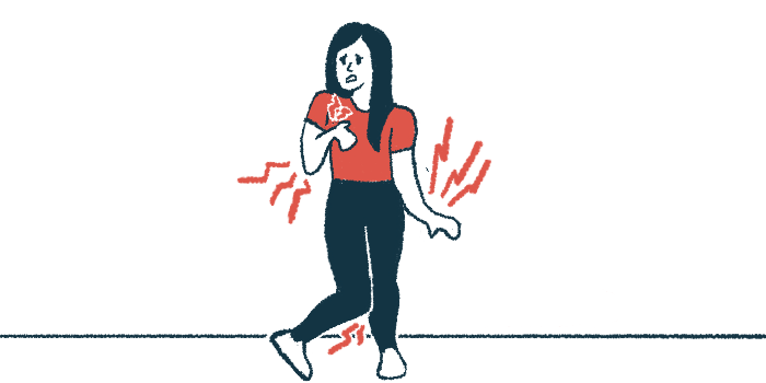 A woman looking pained deals with uncontrolled movements in her arms, hands, and feet.